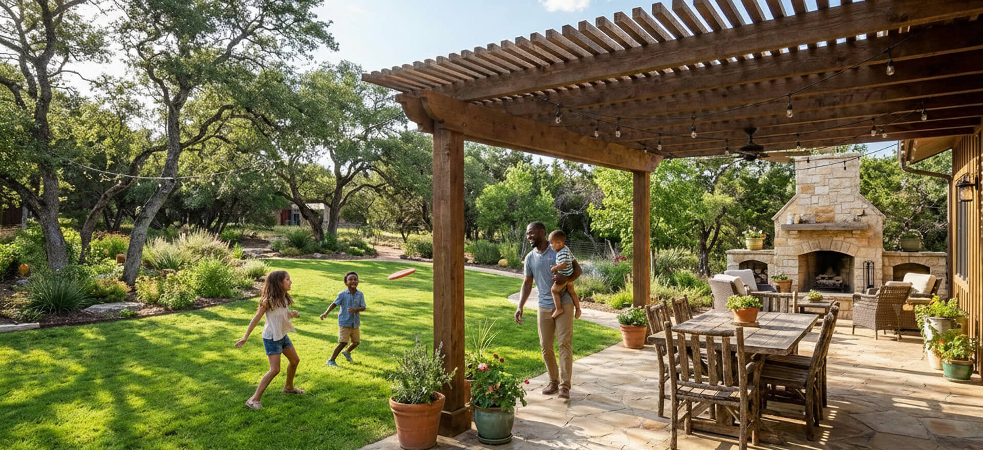 Family enjoying outdoor play in a well-landscaped backyard with green lawn, trees, and patio furniture, highlighting the importance of landscaping in creating inviting spaces.